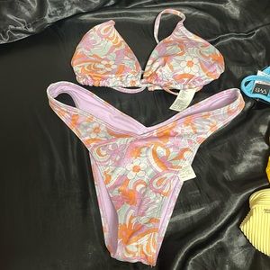 purple with flowers patterns,S,never worn